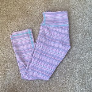 Pink and super cute lulu lemon below the knee leggings.